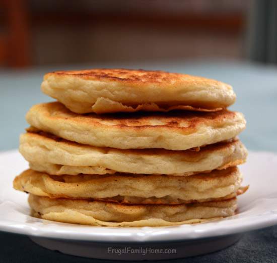 Vegan pancakes on a plate stacked up. 