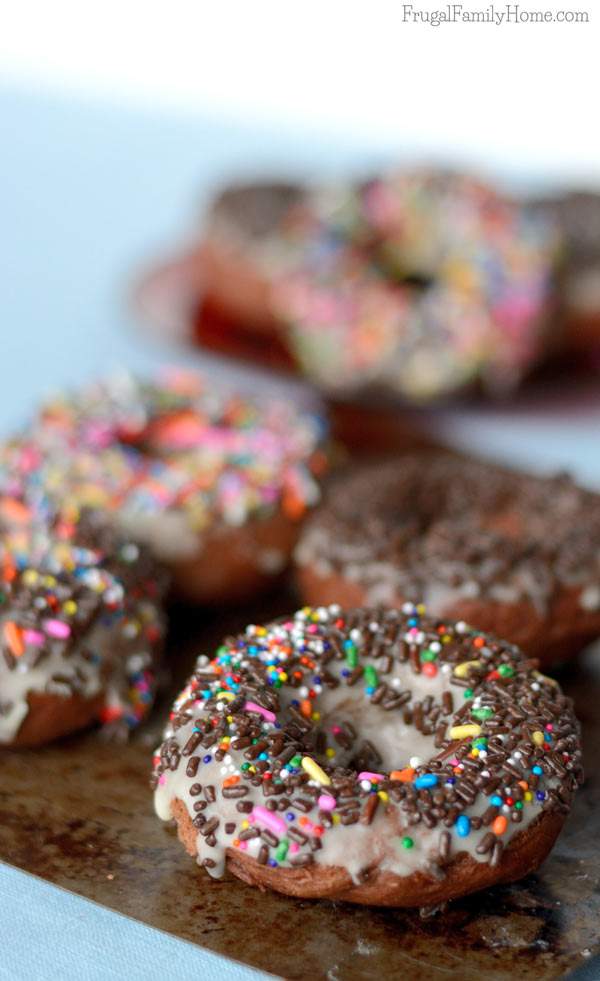 This is an easy and delicious baked donuts recipe. Who wouldn’t love double chocolate donuts that are baked to help keep the fat down? Better yet, these are also dairy free donuts too. You have to see how easy these are to make. If you can measure and stir you can make them too.