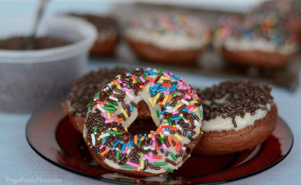 This is an easy and delicious baked donuts recipe. Who wouldn’t love double chocolate donuts that are baked to help keep the fat down? Better yet, these are also dairy free donuts too. You have to see how easy these are to make. If you can measure and stir you can make them too.