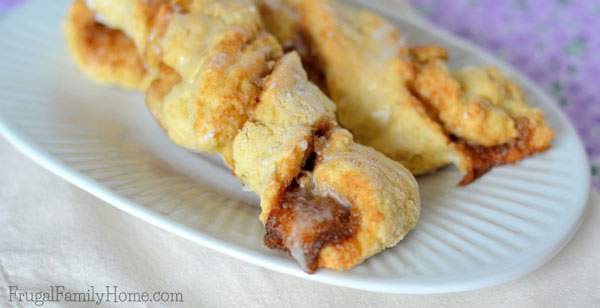 I love how easy these cinnamon twist scones are to make. They are as easy to mix up as biscuits, but turn out looking so fancy. Great for breakfast or brunch when company is coming over. They are also a frugal breakfast recipe costing only $.10 each. My family gobbles these up every time I made them.