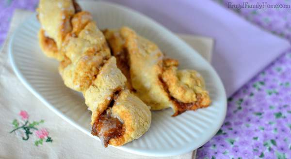 I love how easy these cinnamon twist scones are to make. They are as easy to mix up as biscuits, but turn out looking so fancy. Great for breakfast or brunch when company is coming over. They are also a frugal breakfast recipe costing only $.10 each. My family gobbles these up every time I made them. 