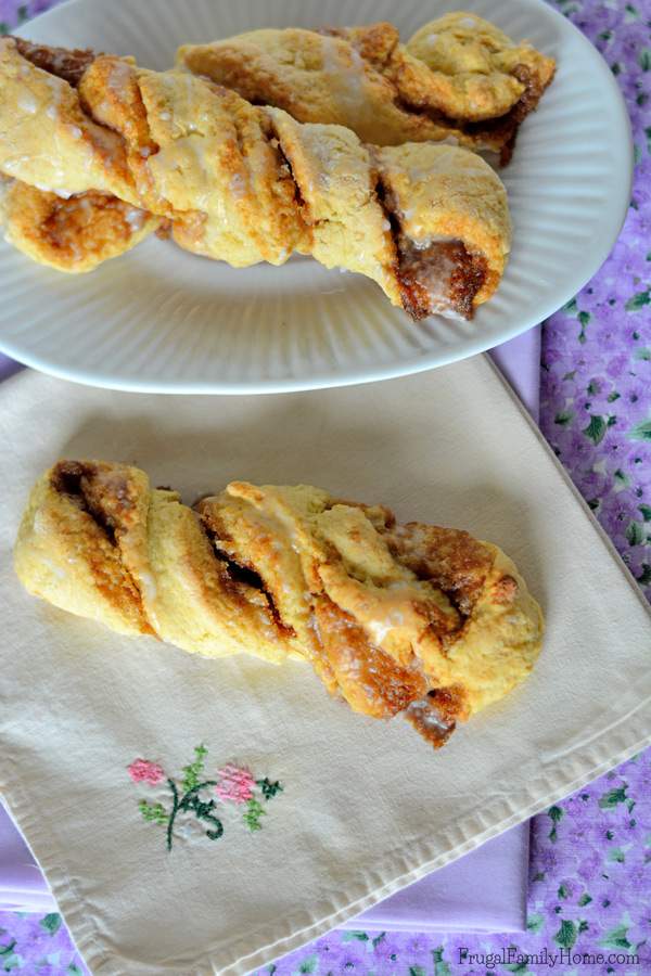 I love how easy these cinnamon twist scones are to make. They are as easy to mix up as biscuits, but turn out looking so fancy. Great for breakfast or brunch when company is coming over. They are also a frugal breakfast recipe costing only $.10 each. My family gobbles these up every time I made them.