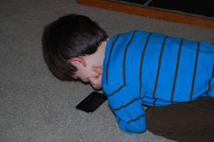 Son playing with itouch