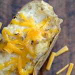 Need a quick dinner your family will love? This recipe for twice baked taco potatoes is sure to please. My family gobbles them up.