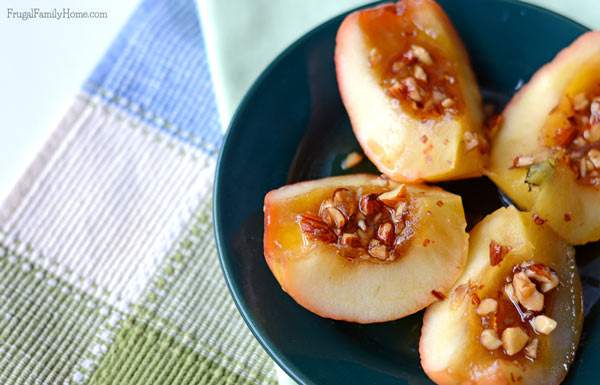 This is a quick and somewhat healthy dessert that our family loves. You only need 4 ingredients and a few minutes to make this baked apple recipe. It’s makes a great fall dessert your family will love.