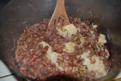 add cooked onions to beans