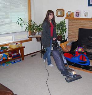 Daughter Vacuuming