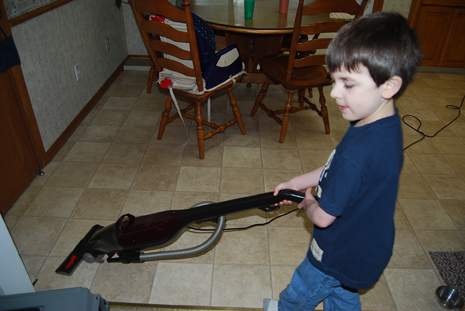 Son Vacuuming
