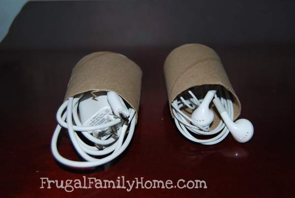 Cords rolled up in toliet paper tube