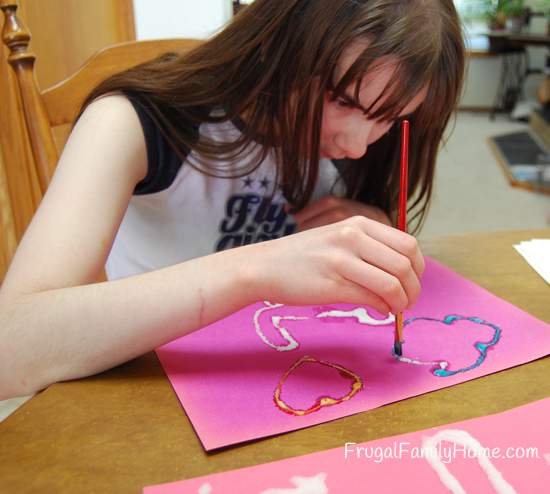 Daughter working on her painting