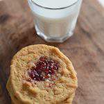 Peanut Butter and Jelly Cookies, these easy and simple peanut butter and jelly cookies make a great dessert or gift. The would make a great addition to a Christmas cookie plate. They are soft baked and a little chewy, just perfect for a peanut butter cookie. When I make these they disappear quickly.