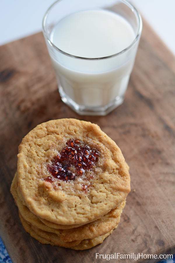 Peanut Butter and Jelly Cookies, these easy and simple peanut butter and jelly cookies make a great dessert or gift. The would make a great addition to a Christmas cookie plate. They are soft baked and a little chewy, just perfect for a peanut butter cookie. When I make these they disappear quickly.