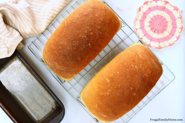 Homemade bread recipe cooling on rack