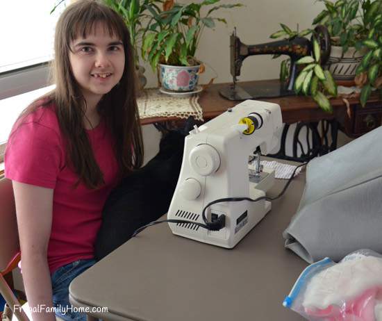 Daughter working on sewing project