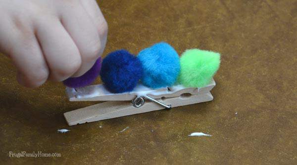 Cute Caterpillar Clips made with Pom Poms | Frugal Family Home
