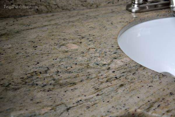 An up close view of our new granite countertop, so much better than the old peach countertop | Frugal Family Home