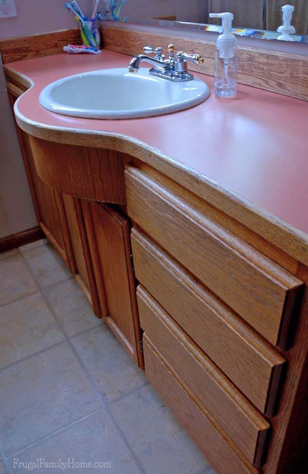 The wood is getting a little worn on the vanity | Frugal Family Home