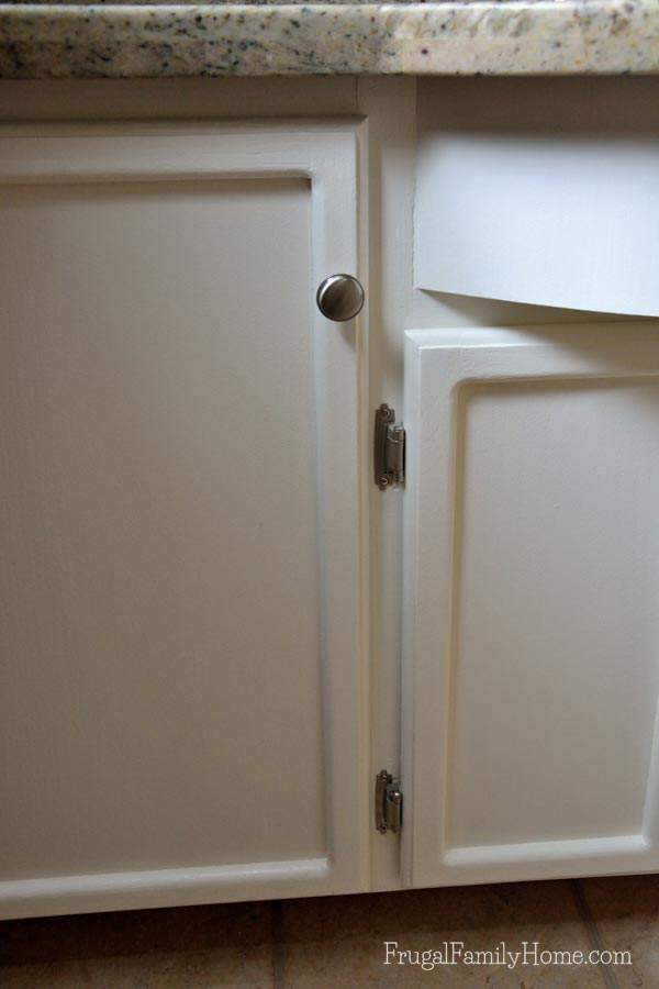The painted finish on the door with the new hinges | Frugal Family Home