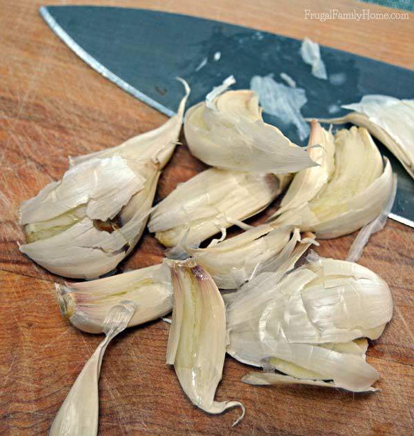 Give the garlic a good smash to get the skins to release | Frugal Family Home