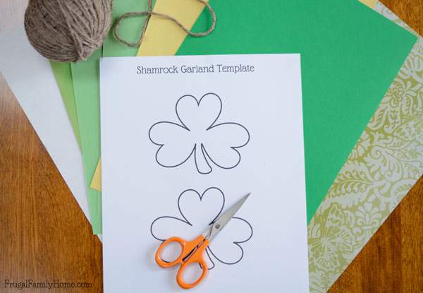 Easy craft for St. Patrick's Day, make a Shamrock Garland to display.