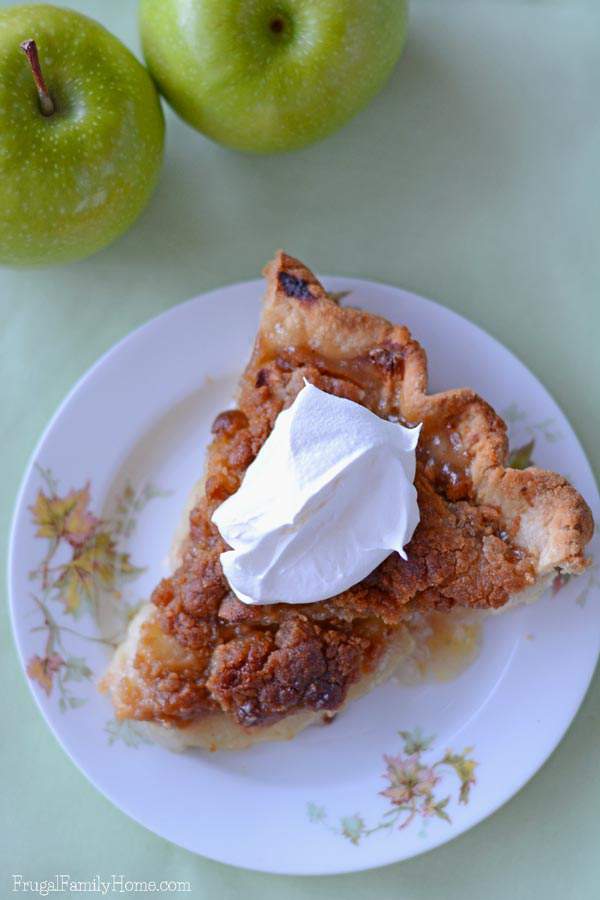 I know this time of year I love to make apple recipes. Apple pie is one of my favorite fall desserts. If you also love to enjoy apples you’re going to want to give this Apple Crumble Pie Recipe a try. It has a crunchy topping over slightly tart apples that make the best pie ever. 