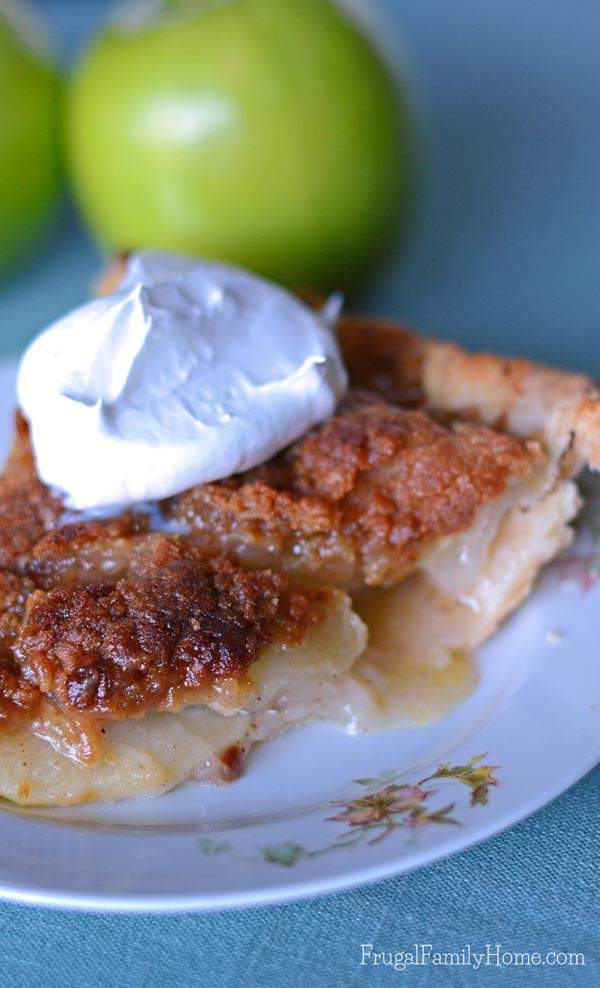 I know this time of year I love to make apple recipes. Apple pie is one of my favorite fall desserts. If you also love to enjoy apples you’re going to want to give this Apple Crumble Pie Recipe a try. It has a crunchy topping over slightly tart apples that make the best pie ever. 