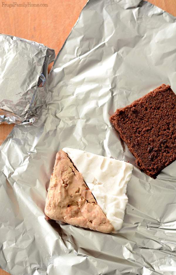 Need a delicious dairy-free dessert to serve? These easy to make frozen brownie sandwiches are dairy free. They have two flavors of frozen dessert sandwiched between a dairy free brownie. Make them fancier by cutting them up and adding them to a stemmed glass. Sprinkle with nutmeg for Thanksgiving or with crushed candy canes for Christmas. They are sure to be a delicious dessert anyway you make them. #DairyFree4All [AD]