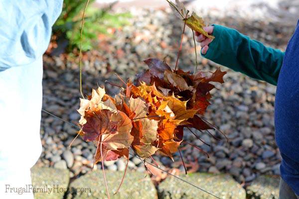 Need a cheap and easy Fall wreath? Try making these leaf wreath for your front door. It takes about an hour and two things, one of which is leaves. It's a great fall activity for the kids to help with too.