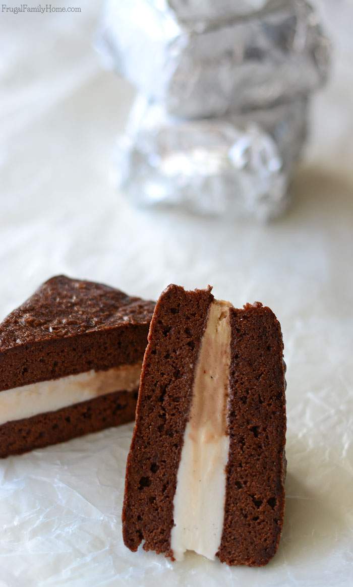 Need a delicious dairy-free dessert to serve? These easy to make frozen brownie sandwiches are dairy free. They have two flavors of frozen dessert sandwiched between a dairy free brownie. Make them fancier by cutting them up and adding them to a stemmed glass. Sprinkle with nutmeg for Thanksgiving or with crushed candy canes for Christmas. They are sure to be a delicious dessert anyway you make them. #DairyFree4All [AD]