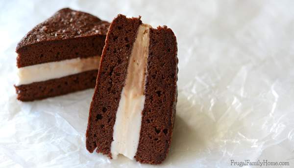 Need a delicious dairy-free dessert to serve? These easy to make frozen brownie sandwiches are dairy free. They have two flavors of frozen dessert sandwiched between a dairy free brownie. Make them fancier by cutting them up and adding them to a stemmed glass. Sprinkle with nutmeg for Thanksgiving or with crushed candy canes for Christmas. They are sure to be a delicious dessert anyway you make them. #DairyFree4All [AD]