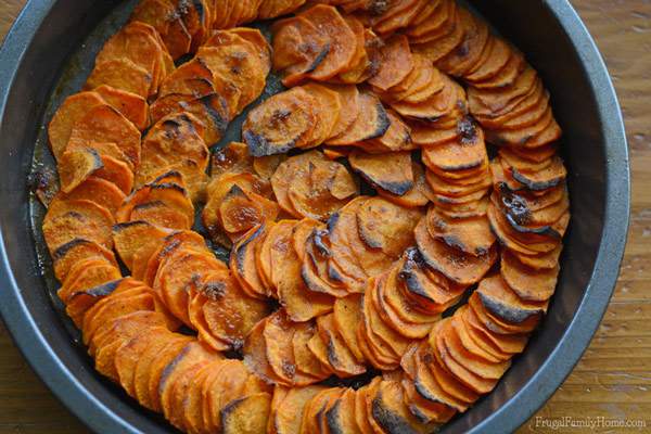 Do you find the regular sweet potato casserole just a little too sweet and heavy? Lighten it up by making these slightly sweet and very delicious roasted sweet potatoes. They are easy to assemble and can bake right alongside your other holiday dishes.