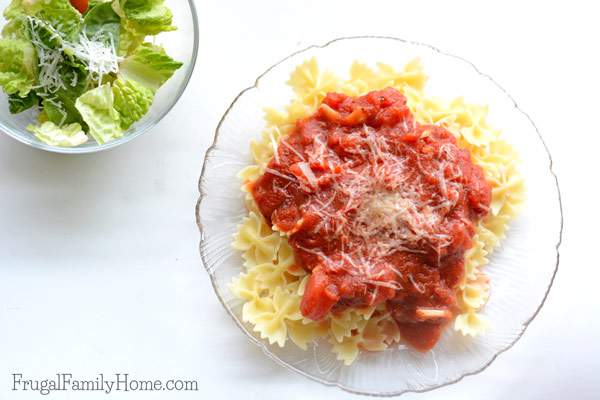 This is the best and easiest homemade pasta sauce I’ve ever made. It’s so simple but tastes so delicious too. It only takes about 20 minutes to make too. Great for a quick and easy dinner any night of the week. If you can open a few cans and slice garlic you can make this delicious sauce in just minutes for a quick and easy dinner. Add in cooked ground beef or cooked sausage to beef it up.