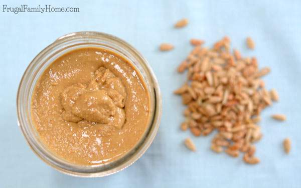 Ever wonder how to make your own nut butter? I know I usually buy it at the store, but when the store was sold out, I had to find an alternative. This is a great tutorial for how to make your own sunflower butter at home. Just two ingredients and a food processor are all that is needed. Plus you can save almost $.20 an ounce over the store bought sunflower butter which is quite a good amount of savings.