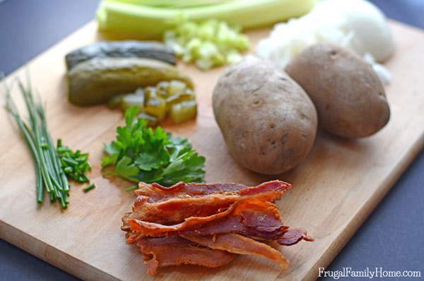 This is the best potato salad recipe ever. It has the creaminess of original potato salad but with an added crunch of bacon. Yum, who can resist bacon? Then add the fresh taste of the parsley and chives to make the perfect potato salad recipe. I love to make this recipe for barbecues and parties, everyone raves about it. 