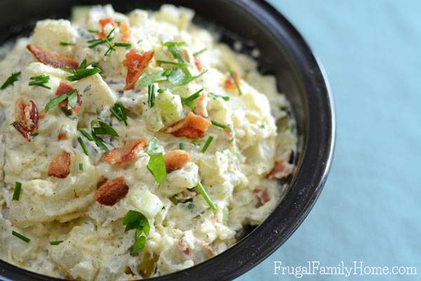 This is the best potato salad recipe ever. It has the creaminess of original potato salad but with an added crunch of bacon. Yum, who can resist bacon? Then add the fresh taste of the parsley and chives to make the perfect potato salad recipe. I love to make this recipe for barbecues and parties, everyone raves about it. 