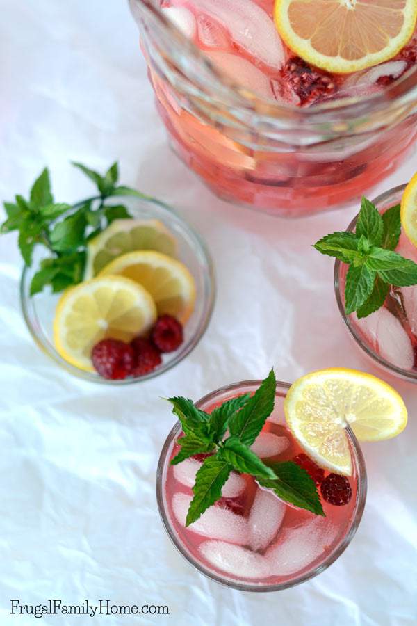 This is the best homemade lemonade I’ve made. It easy to make and is made with lemon juice. The fresh raspberries and mint really make it special. The mint isn’t overpowering, it has just the right balance of flavors. It’s an easy raspberry mint lemonade recipe you can make for every day during the summer. You can garnish the lemonade to make it fancy enough for parties.