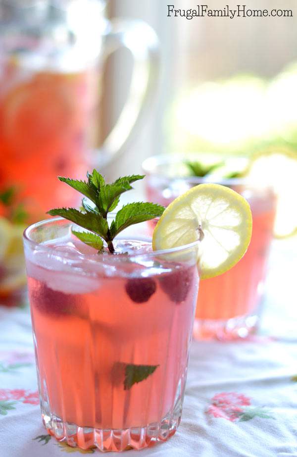 This is the best homemade lemonade I’ve made. It easy to make and is made with lemon juice. The fresh raspberries and mint really make it special. The mint isn’t overpowering, it has just the right balance of flavors. It’s an easy raspberry mint lemonade recipe you can make for every day during the summer. You can garnish the lemonade to make it fancy enough for parties.