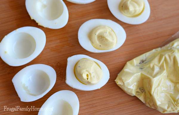Deviled eggs there are so many ways to make them. You can make them spicy, you can make them unique, you can even make them with bacon, but my favorite way to make them is the way my grandma used to make deviled eggs. Her recipe is a simple and easy recipe with just a hint of sweetness from her unique ingredient. You need to give this recipe a try. It’s a great after school snack too.