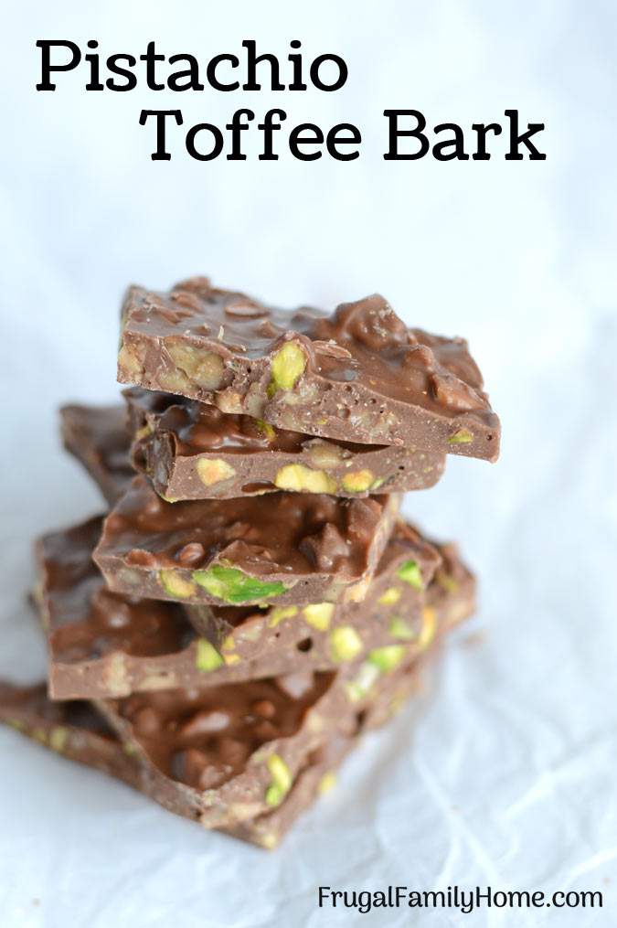 An easy recipe for Pistachio Toffee Bark ~ This candy recipe is super easy but you don’t have to let anyone know that. Impress your friends by making them a batch of this homemade pistachio candy bark for Christmas. It’s easy to make only taking 3 ingredients and about 5 minutes to make. There’s even a step by step video tutorial for this candy recipe.