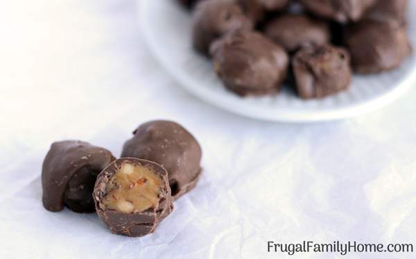 This is an easy chocolate covered peanut butter balls recipe. They make a great Christmas candy to share with others if you can keep from gobbling them all up yourself. They are a great treat for almost any holiday.