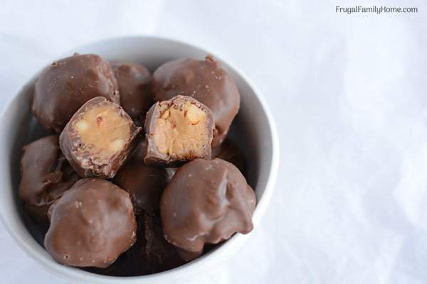 This is an easy chocolate covered peanut butter balls recipe. They make a great Christmas candy to share with others if you can keep from gobbling them all up yourself. They are a great treat for almost any holiday.