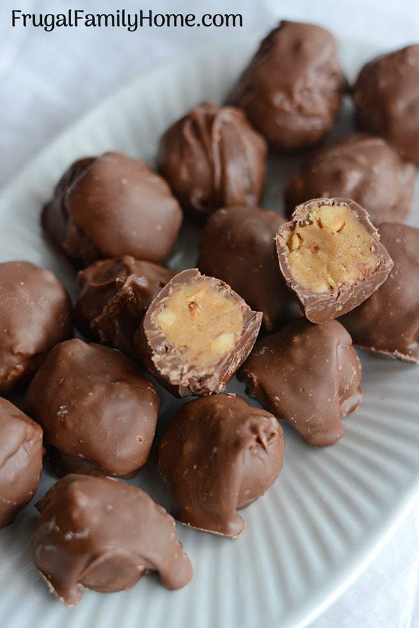 This is an easy chocolate covered peanut butter balls recipe. They make a great Christmas candy to share with others if you can keep from gobbling them all up yourself. They are a great treat for almost any holiday.