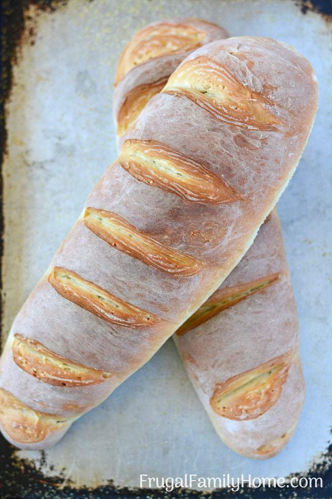 The Best Homemade French Bread Recipe ~ Only 5 ingredients needed to make your own crusty and delicious french bread at home. This is a tried and true easy recipe we use all the time that only cost $.17 a loaf. It always turns out delicious and pretty too.