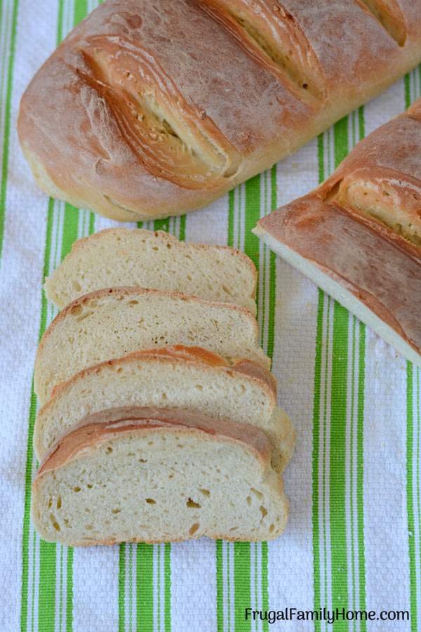 The Best Homemade French Bread Recipe ~ Only 5 ingredients needed to make your own crusty and delicious french bread at home. This is a tried and true easy recipe we use all the time that only cost $.17 a loaf. It always turns out delicious and pretty too.