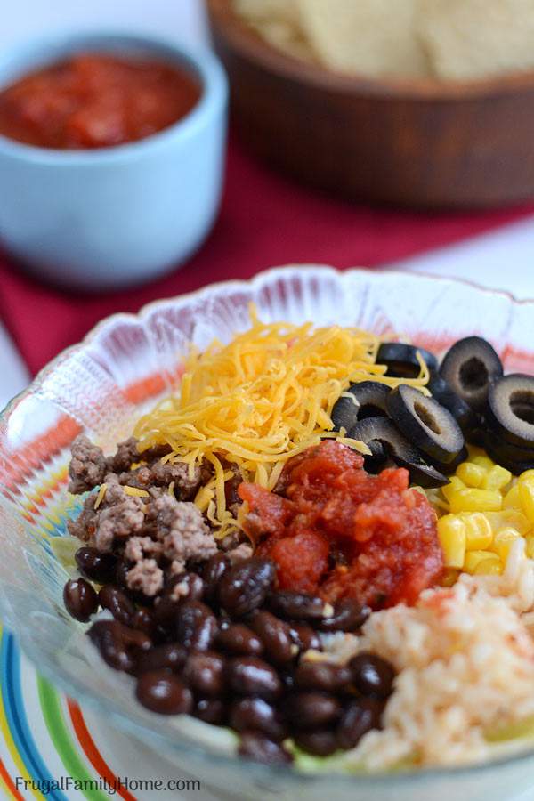 A quick and easy dinner, taco bowls. These are made with ground beef and are quick to make. Just a few simple ingredients are all that is needed. They are a favorite at our house.