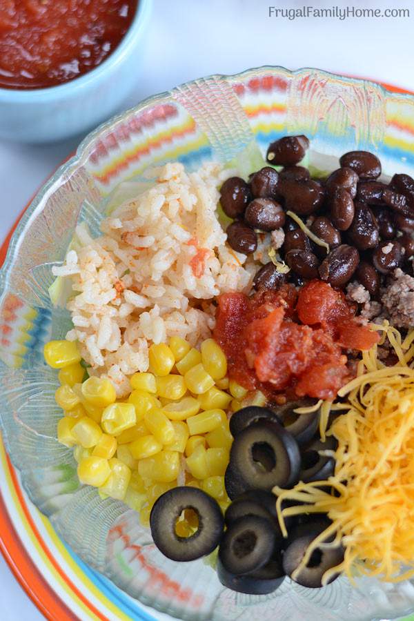 A quick and easy dinner, taco bowls. These are made with ground beef and are quick to make. Just a few simple ingredients are all that is needed. They are a favorite at our house.