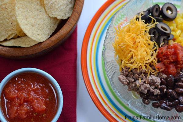 A quick and easy dinner, taco bowls. These are made with ground beef and are quick to make. Just a few simple ingredients are all that is needed. They are a favorite at our house.