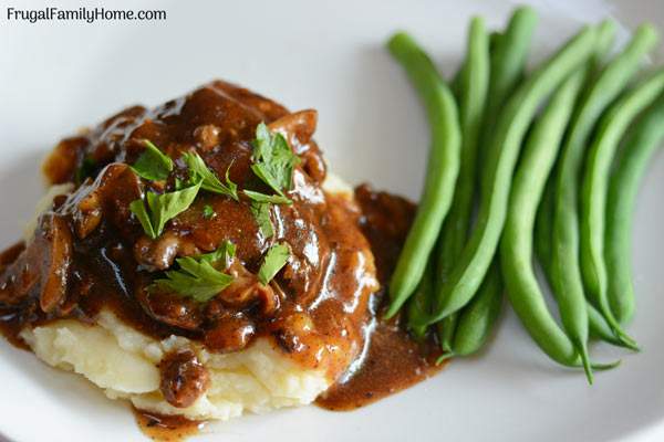 A simple and easy Salisbury steak recipe with mushroom gravy. This is an easy recipe for Salisbury steak that only takes about 30 minutes to make and costs less than $1 per serving.