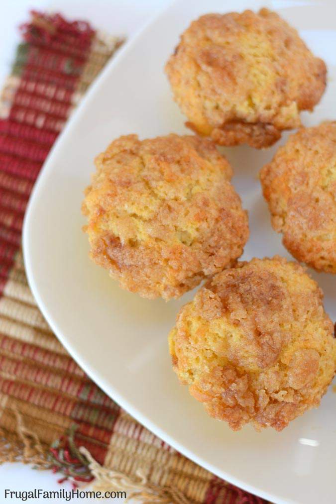 Easy to make pumpkin muffins with crumble topping. These pumpkin muffins are the best, most moist from scratch muffins you can make. They are perfect for fall. The recipe has vegan options too.