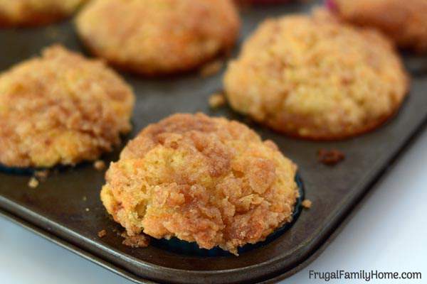 Easy to make pumpkin muffins with crumble topping. These pumpkin muffins are the best, most moist from scratch muffins you can make. They are perfect for fall. The recipe has vegan options too.